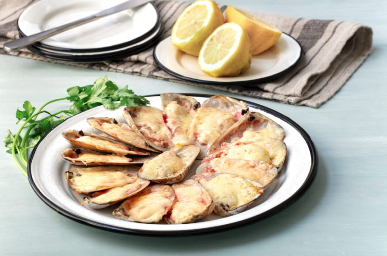 Machas a la parmesana una de las 10 mejores preparaciones de almejas en el mundo